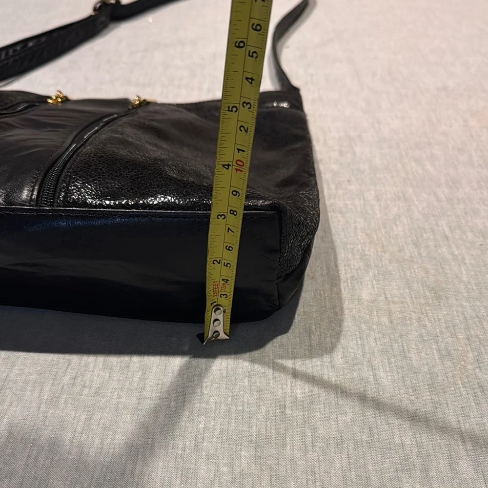 Genuine leather Women Sleek Black Crossbody Bag with Structured Desig